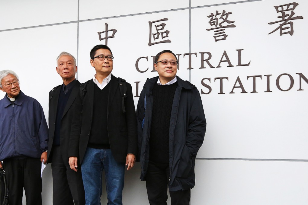 Cardinal Joseph Zen and Occupy Central co-founders  Reverend Chu Yiu-Ming, Dr Chan Kin-man and Benny Tai Yiu-ting surrender to police at Central Police Station. Photo: Sam Tsang