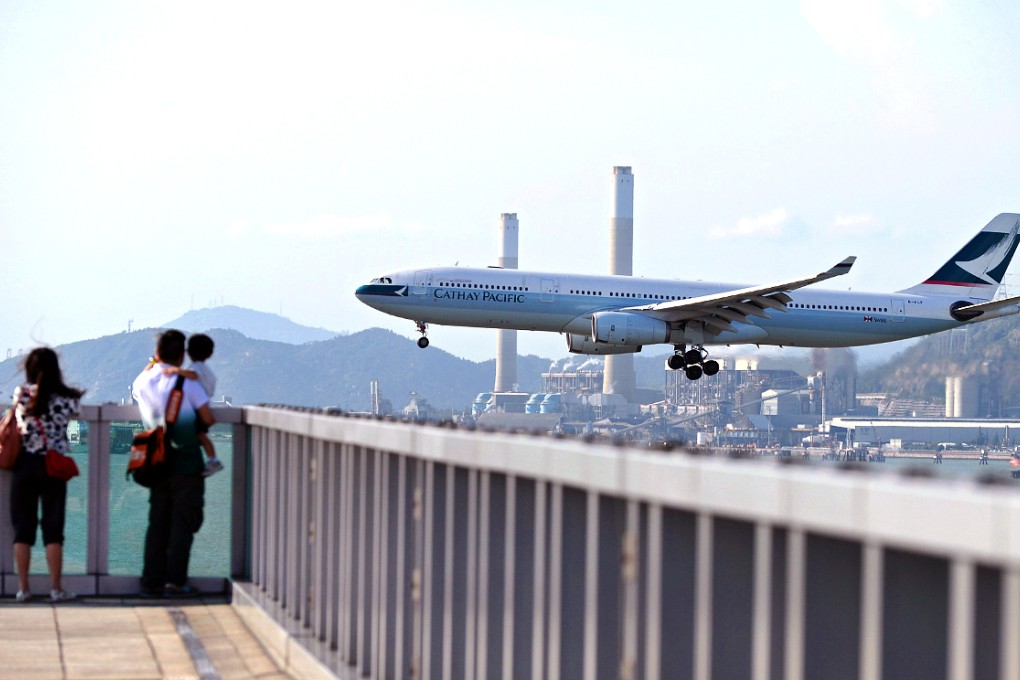 Cathay Pacific pilots have decided to press ahead with work-to-rule action. Photo: AFP