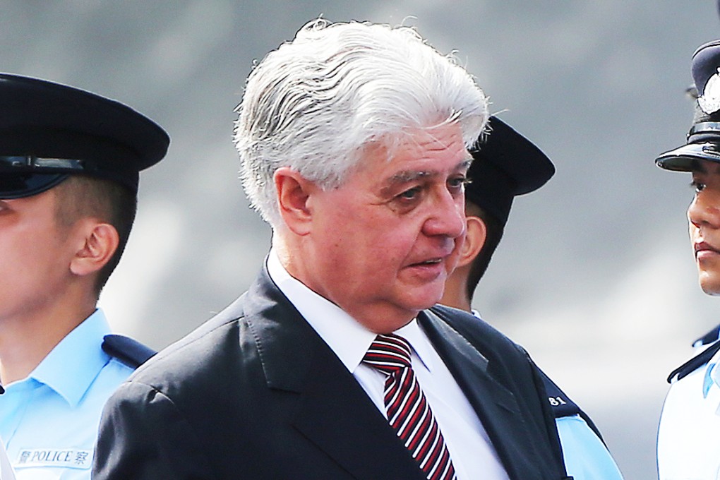 Mr Justice Darryl Saw (center), the Commissioner on Interception of Communications and Covert Surveillance, reports on compliance with the law by four agencies which were granted spying applications last year. Photo: Sam Tsang