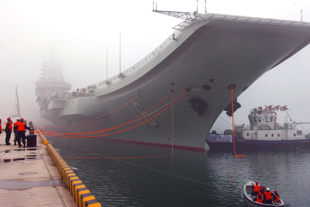 China's first aircraft carrier Liaoning anchors at its home port in Qingdao, Shandong. Photo: Xinhua