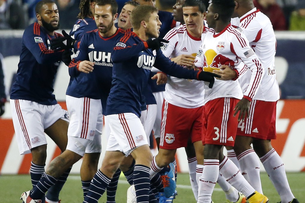 New England Revolution players scuffle with New York Red Bulls players in a classic case of "handbags". Photo: AP