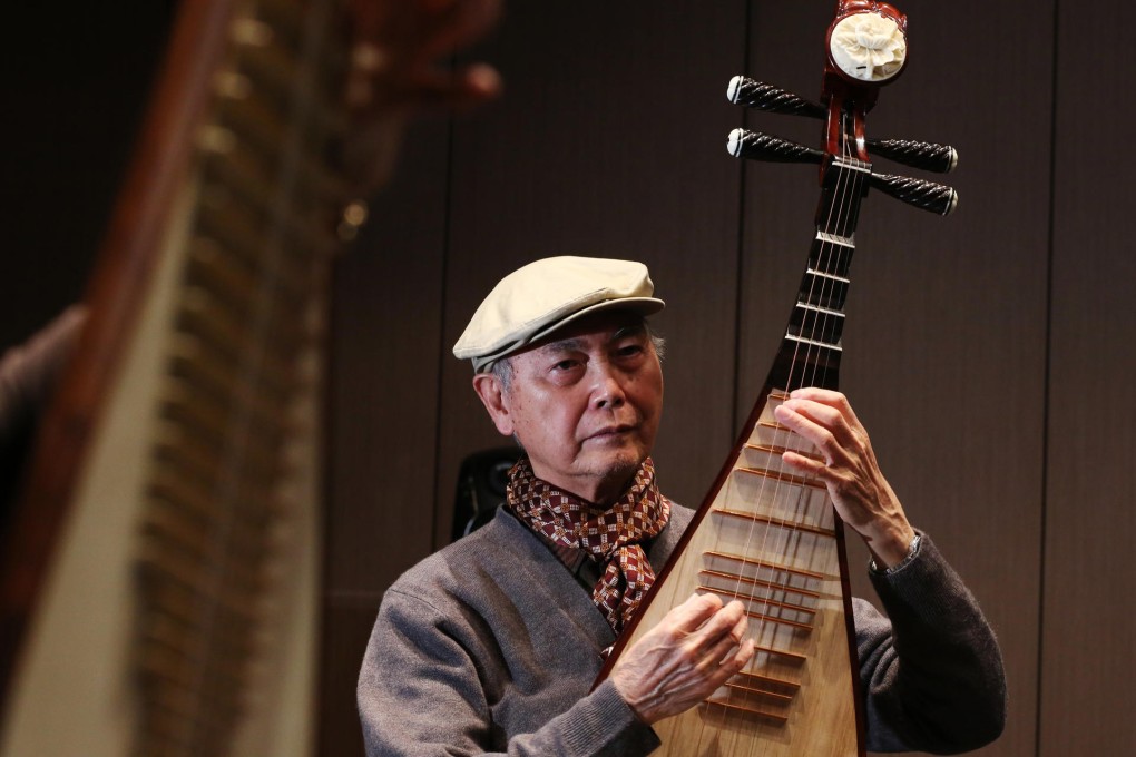 Lui Pui-yuen with his pipa. The master musician, who performs tomorrow, says that in his 80s he can offer his former hometown a sense of tranquility. Photo: Nora Tam