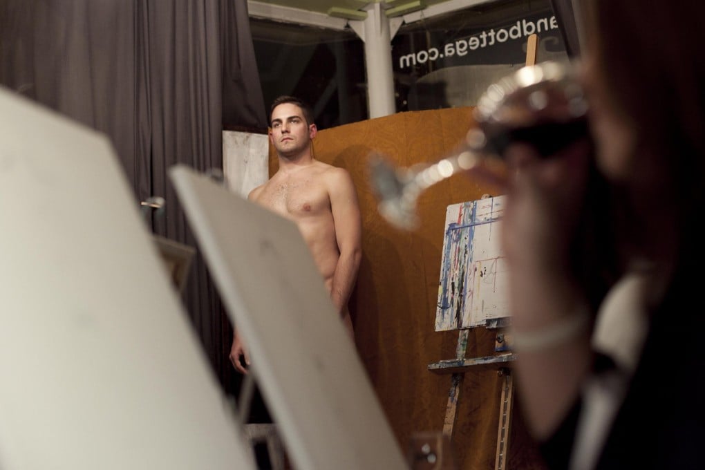 Jonathan Miller poses for women painters at Bottle & Bottega. Photo: TNS