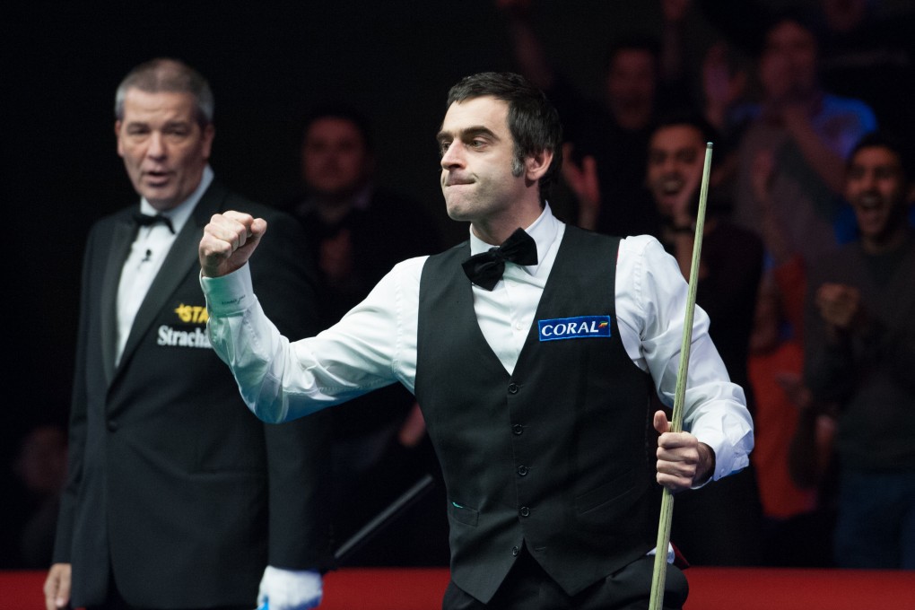 Ronnie O'Sullivan celebrates his 147. Photo: AP