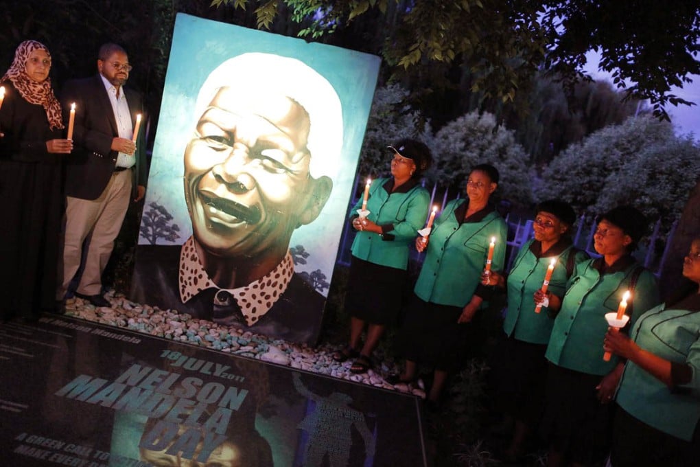 A candlelit memorial for Nelson Mandela in Soweto ahead of first anniversary of the anti-apartheid icon's death. Photo: EPA