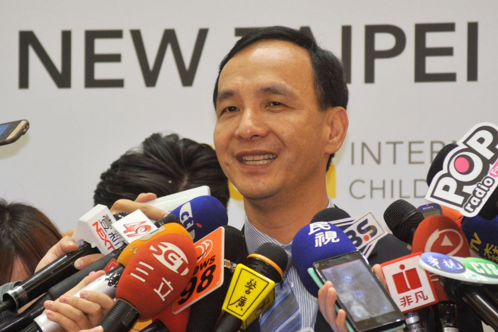 Eric Chu speaks to the press in Taipei on Wednesday. Chu will have to stake out his position on cross-strait issues if he runs for president in 2016, analysts say. Photo: CNA