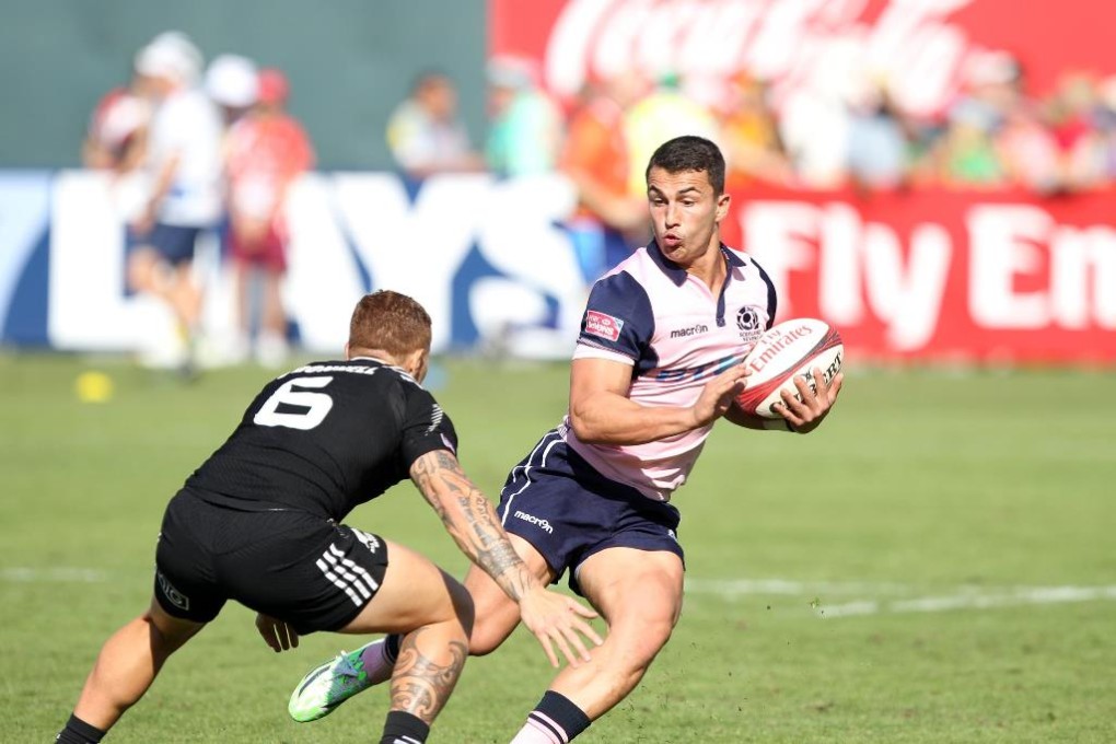 Daniel Hoyland of Scotland in action against New Zealand on the first day of the Dubai Sevens. Photo: Martin Seras Lima/World Rugby