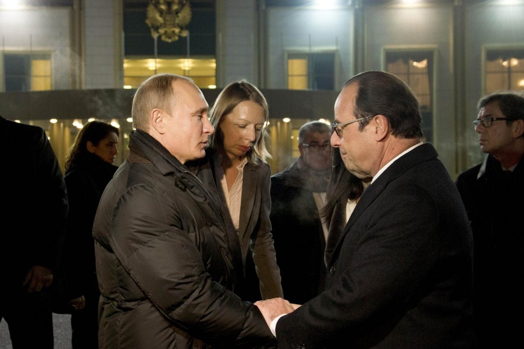 Vladimir Putin (left) meets with Francois Hollande. Photo: AFP