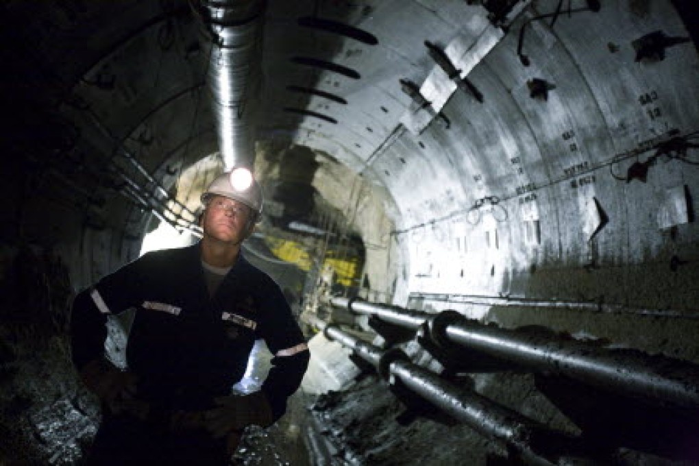 A geologist inspects a shaft at Cameco''s Cigar Lake uranium mine in northern Saskatchewan, Canada. Photo: Bloomberg