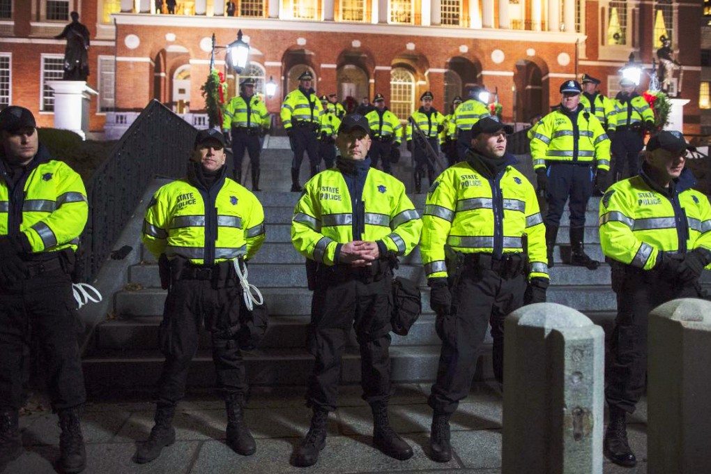 State Police officers stand guard during a protest against the grand jury decision not to indict an officer who used a fatal chokehold on an unarmed man. Photo: AFP