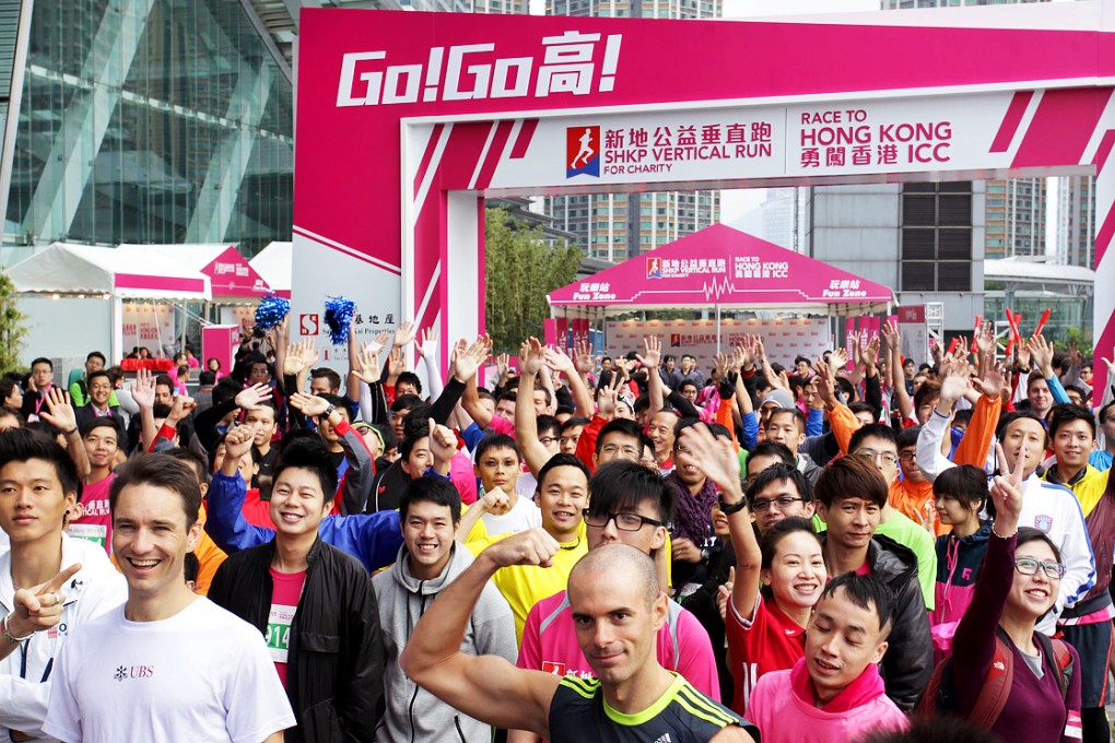 Competitors outside the 484-metre International Commerce Centre in West Kowloon. Photo: Dickson Lee