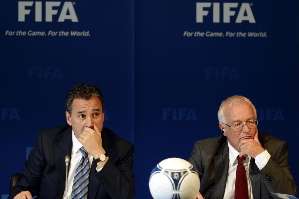 Michael Garcia (left) and Fifa's ethics chief Hans-Joachim Eckert. Photo: EPA