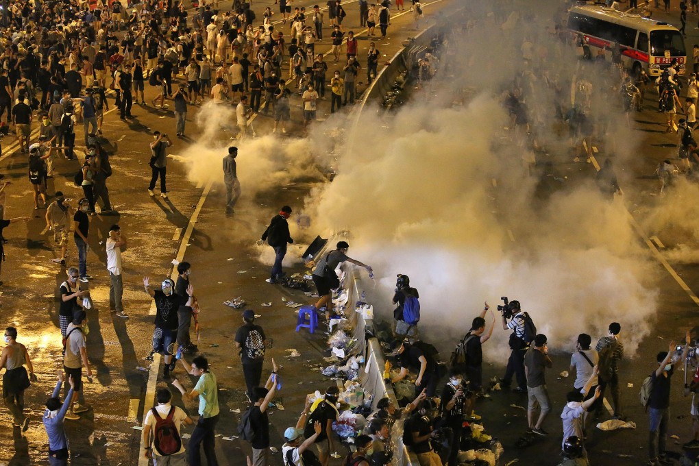 Police use tear gas on protesters in September. Photo: Sam Tsang