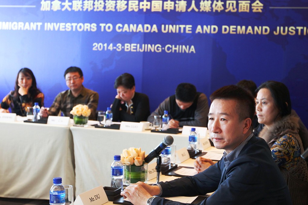 Would-be immigrant investors stage a press conference in Beijing in March to express their disappointment after the Canadian government shut down its immigrant investor programme. A replacement scheme will subject applicants to tougher scrutiny. Photo: Simon Song