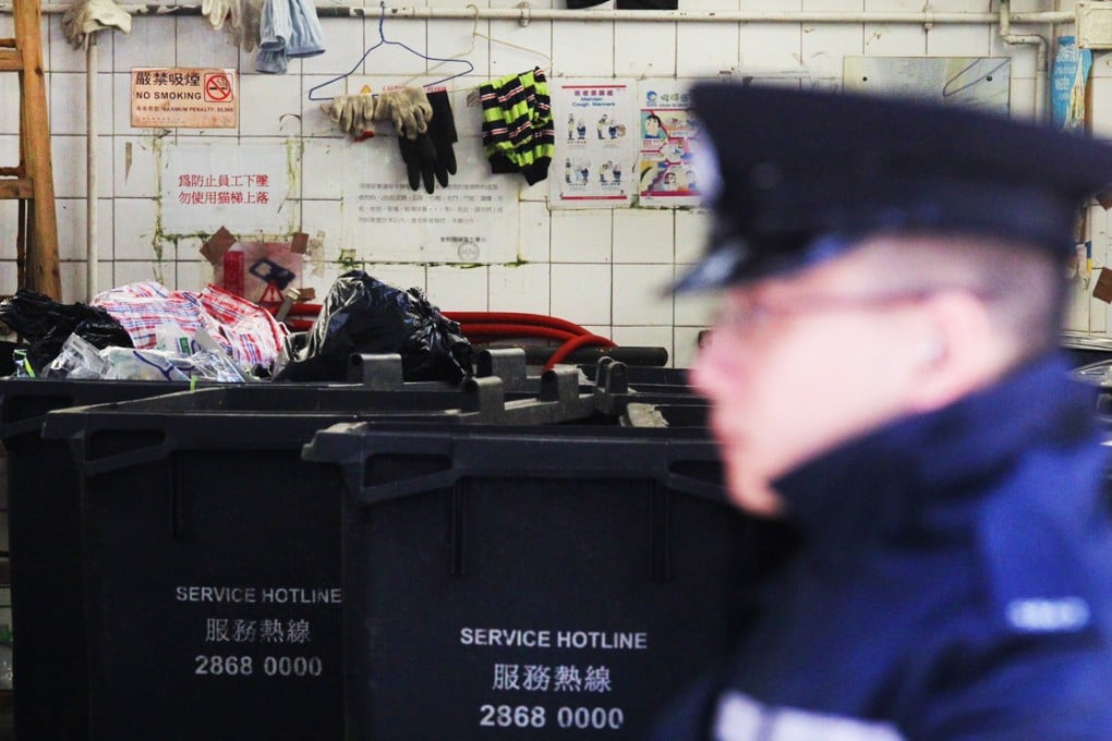 Police were called after the body was discovered at the rubbish collection centre in Portland Street. Photo: May Tse
