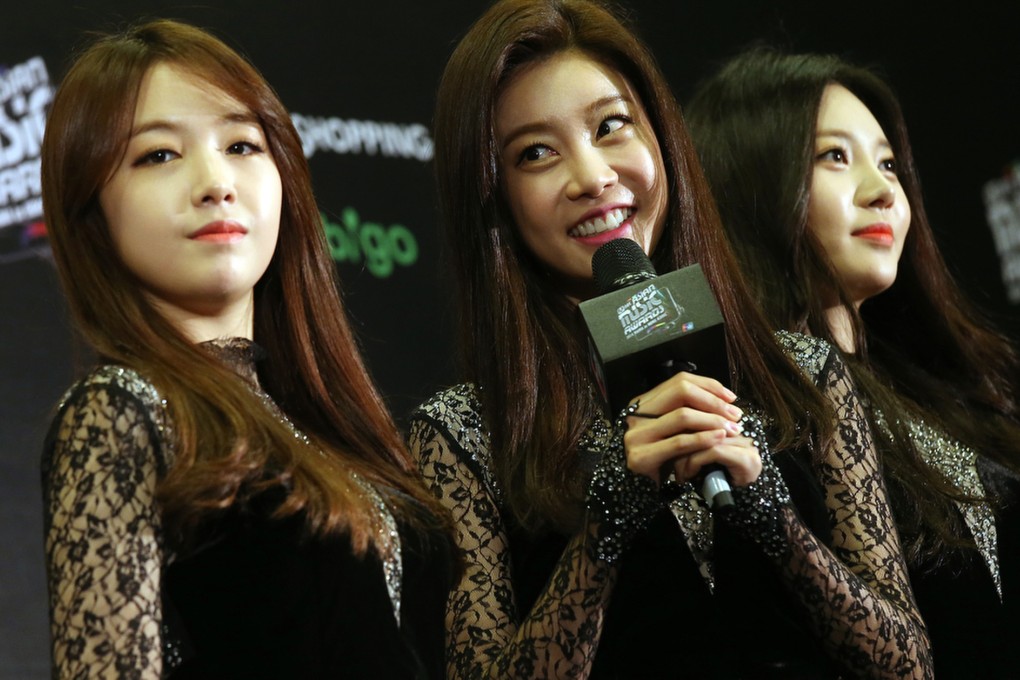 South Korean girl group Girl's Day, pose for photographs at the 2014 Mnet Asian Music Awards at the AsiaWorld-Expo last Wednesday. Photo K. Y. Cheng