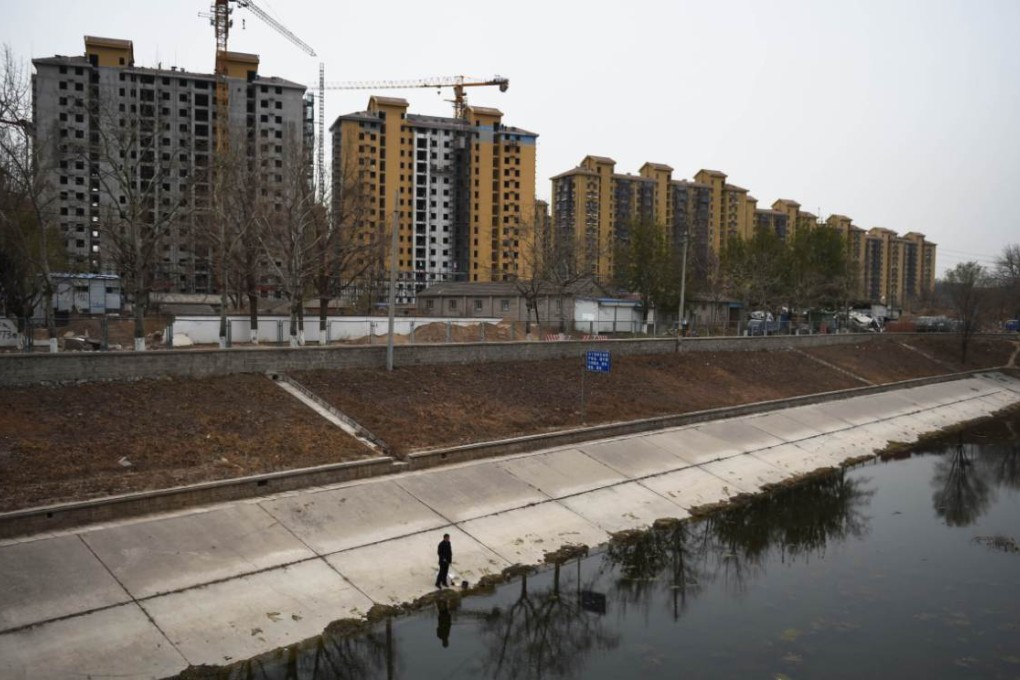 A number of regional banks had high exposure to real estate loans at a time when property prices were falling, challenging developers' ability to repay bank loans. Photo: AFP