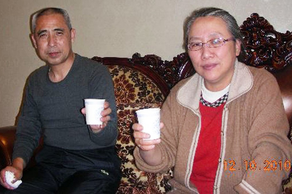 Hada, with his wife Xinna, after he was released from jail. Photo: AFP