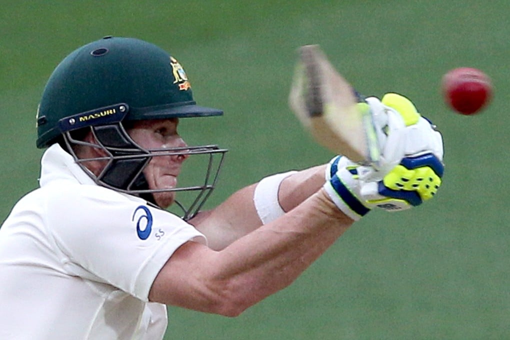 Australia's Steve Smith drives the ball during the second day of their cricket test match against India in Adelaide. Photo: AP