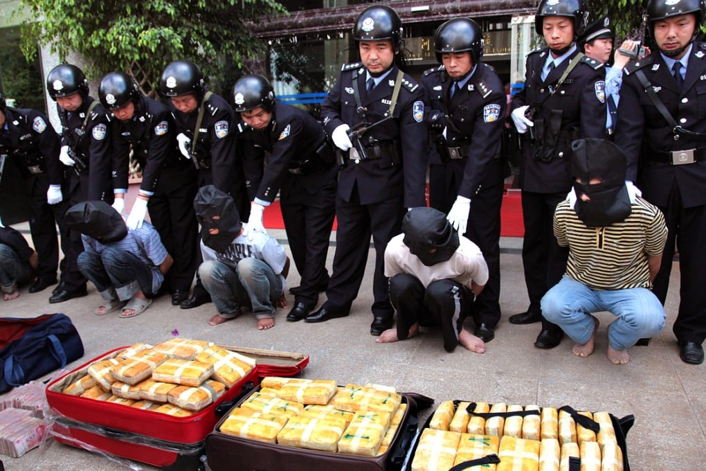 Authorities bust a gang of drug traffickers in Yunnan province, which borders the Golden Triangle known for its rampant drug trade. Photo: SCMP Pictures
