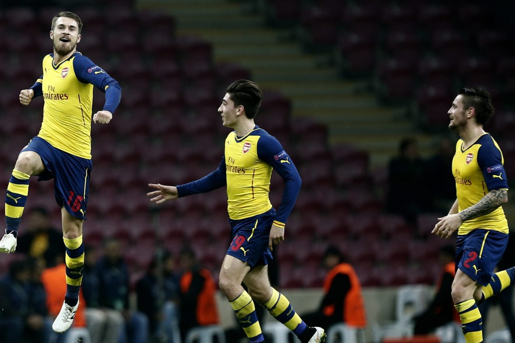 Arsenal's Aaron Ramsey celebrates his goal with teammates during the Uefa Champions League group D match against Galatasaray. Photo: EPA