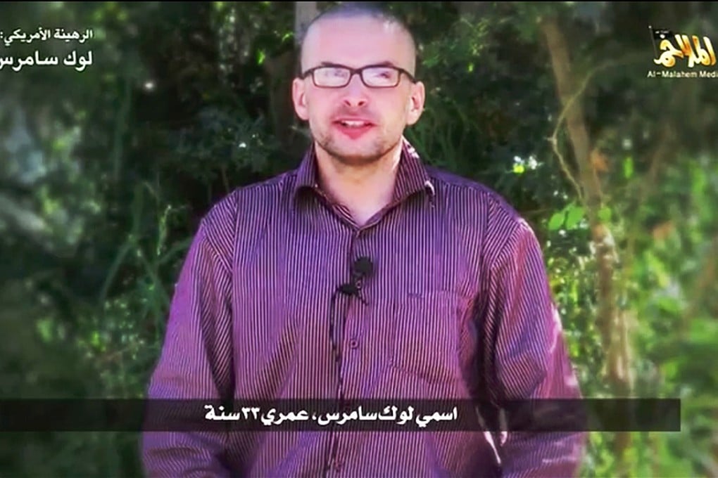 A man, who identified himself as Luke Somers, speaks in a video purportedly published by Al Qaeda's Yemen branch. Photo: Reuters