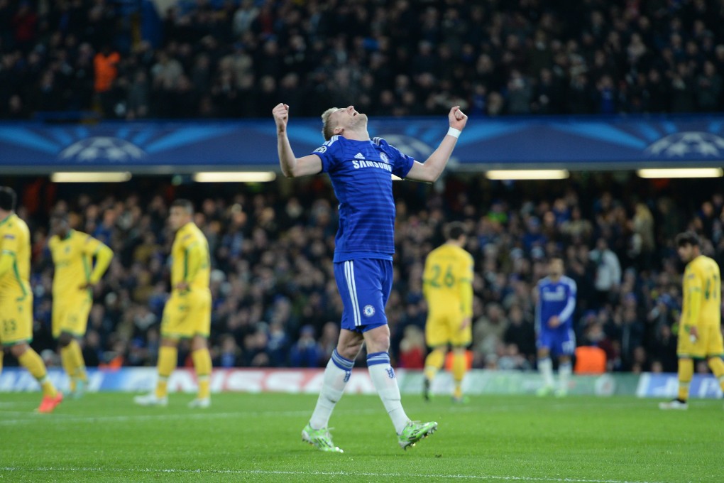 Chelsea's Andre Schuerrle celebrates scoring against Sporting Lisbon. Photo: EPA