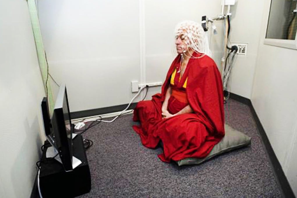 Matthieu Ricard prepares for an electroencephalography, or EEG, test in 2008. Photo: AFP