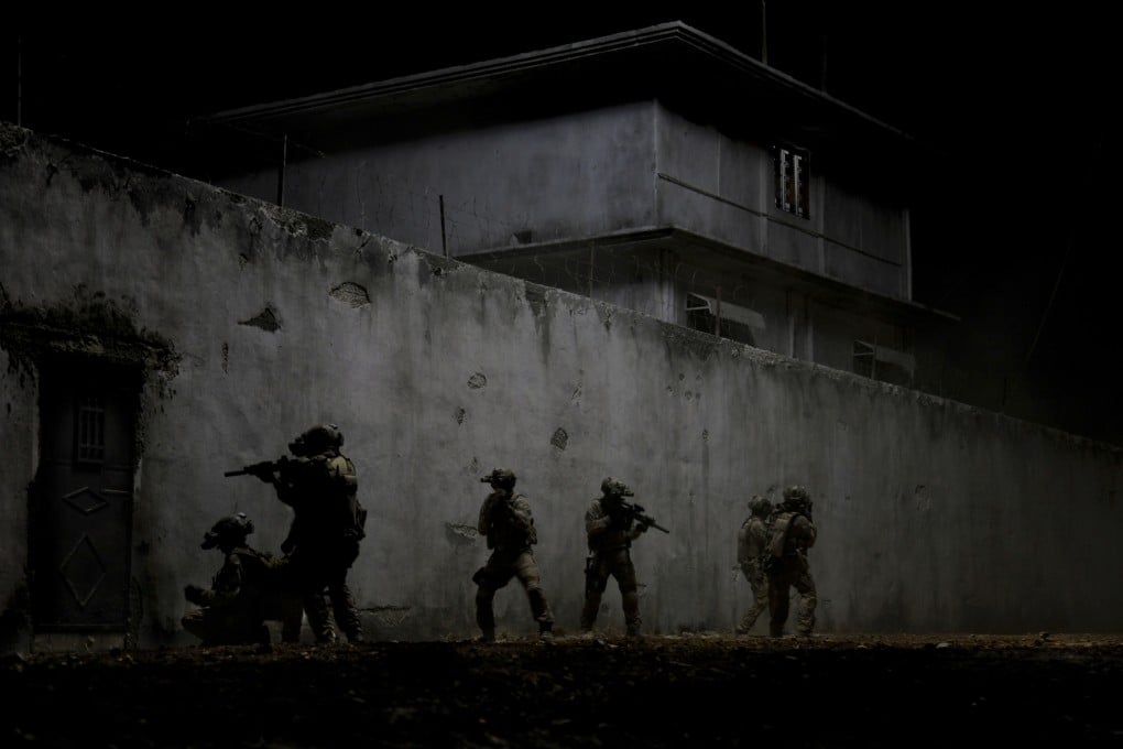 A scene from Zero Dark Thirty depicts Navy Seals raiding the compound of Osama bin Laden. Photo: AP