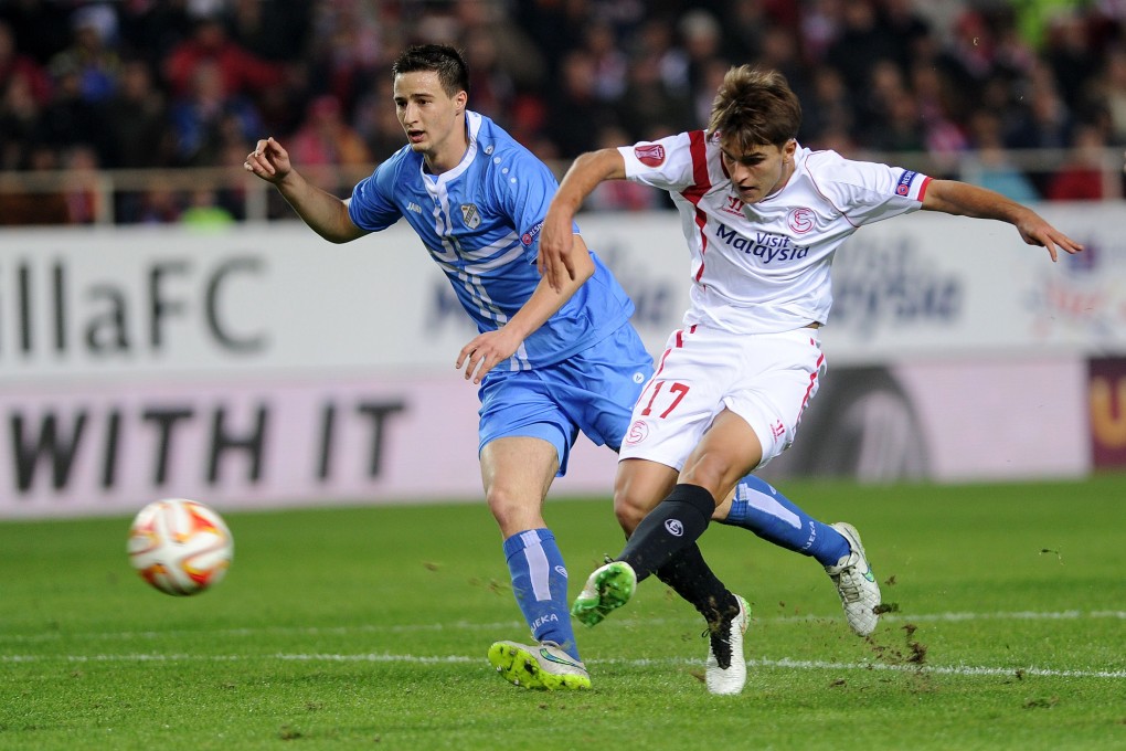 Sevilla's Denis Suarez scores against Rijeka. Photo: AFP