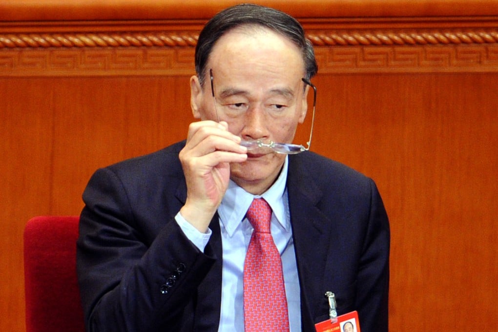 Wang Qishan, a member of the Politburo standing committee, is leading the sweeping anti-corruption drive. Photo: AFP