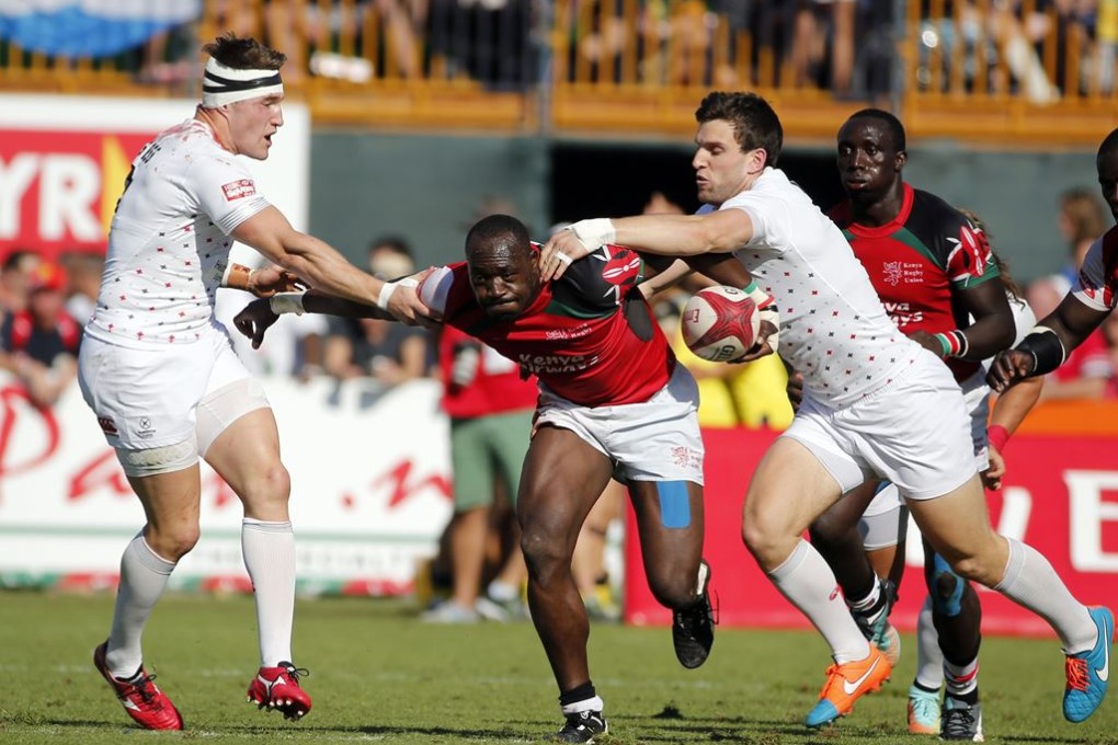 England’s Charlie Hayter (right) and Phil Burgess tackle Daniel Sikuta of Kenya, who struggled against all opponents during the Australia and Dubai legs of the 2014-15 Sevens World Series. Photo: AFP