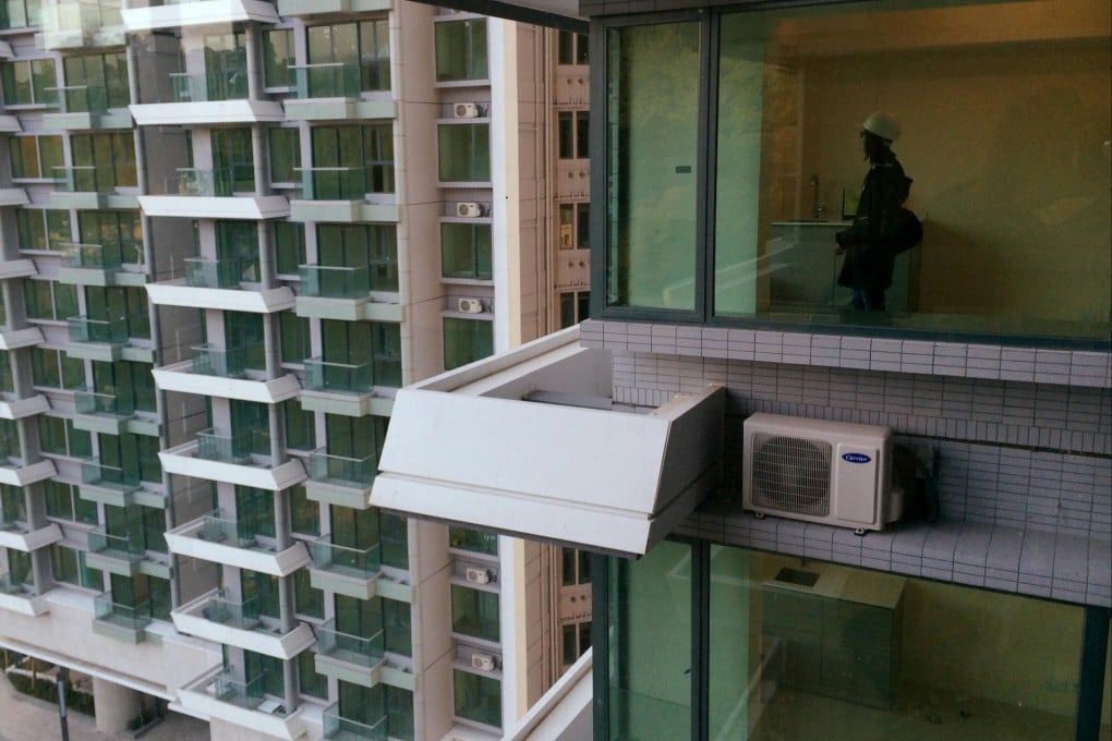 The tiny flats had just enough room for a relatively small person to spread her arms. Photos: Felix Wong