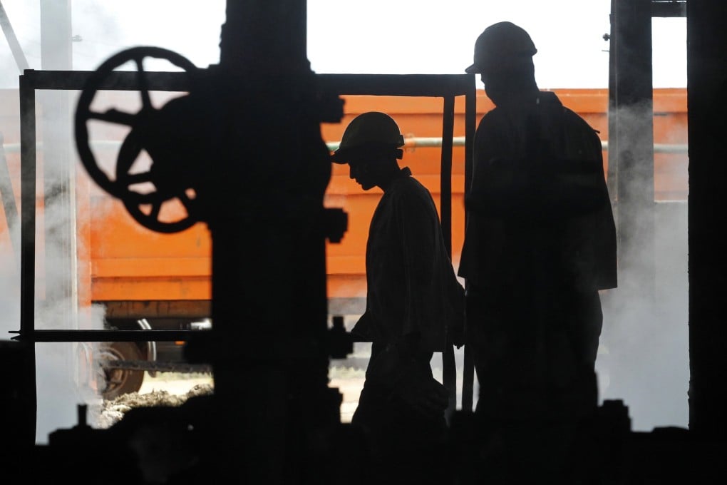 Workers at a sugar factory. The Chinese embassy in Madagascar has complained that authorities were not upholding a duty to protect the Chinese-run Sucoma factory, where a deadly strike occurred. Photo: Reuters