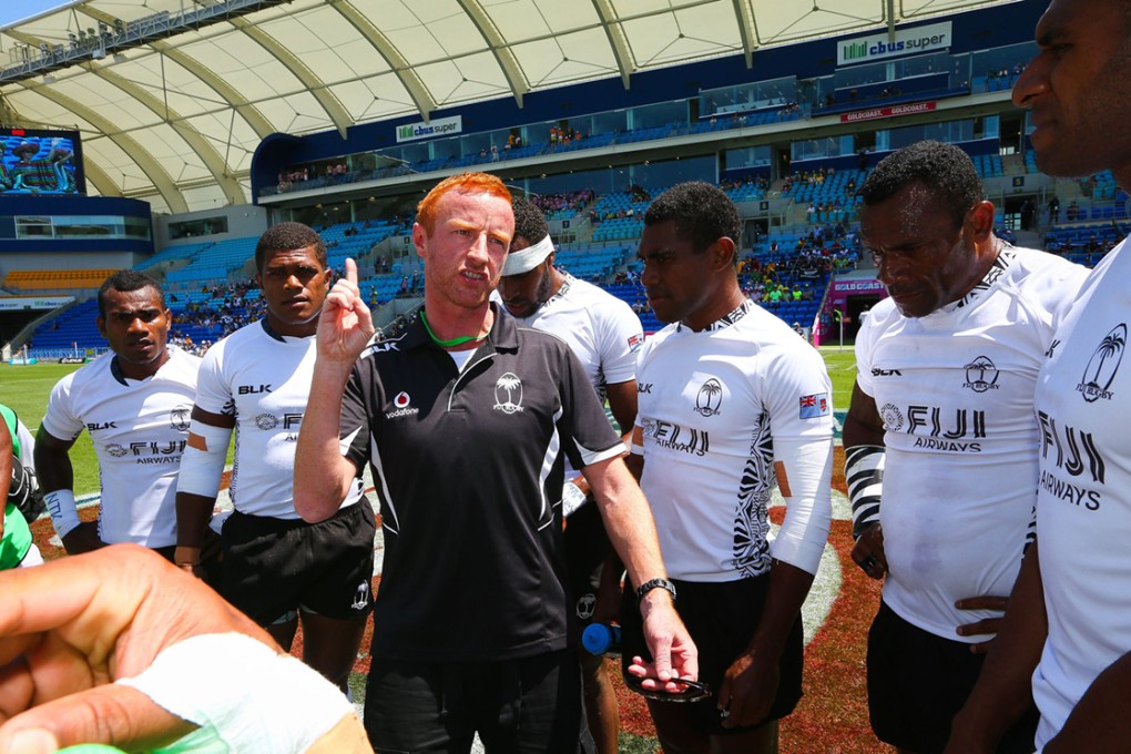 Fiji sevens coach Ben Ryan talks to his players before the start of the 2014 Gold Coast Sevens in Australia. Ryan says the loss of talented Fijians lured overseas by better wages is threatening the Pacific islanders’ preparations for the 2016 Rio Olympics. Photo: AFP
