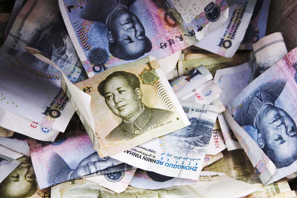 The equivalent of US$249.5 billion was moved out of the mainland illicitly in 2012, the report says, up 53 per cent year on year. Photo: Reuters