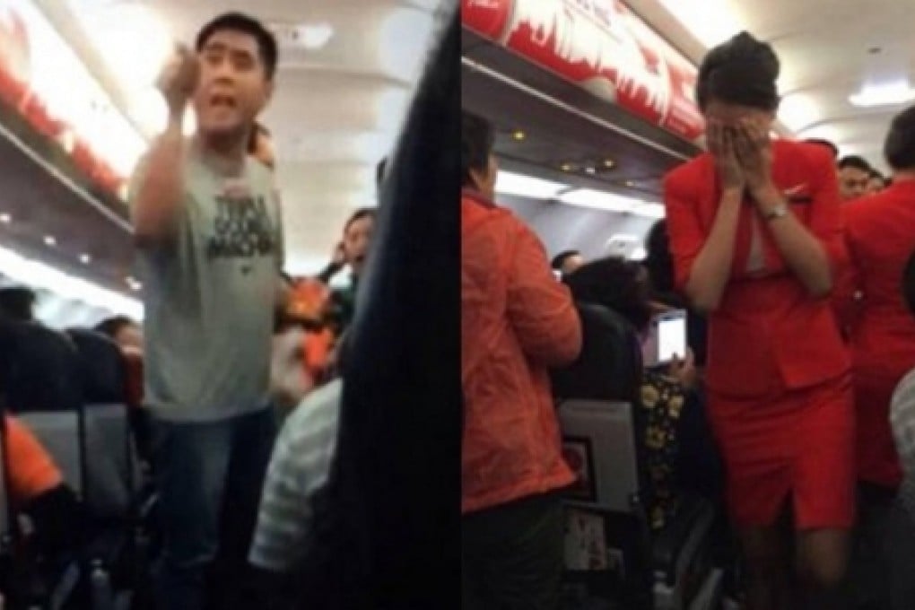 Trouble in the air: a passenger yells at staff, while a stewardess is reduced to tears