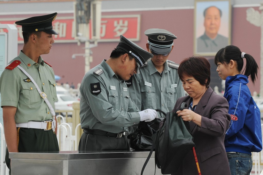 Security checks have been tightened on Beijing's public transport, including the entrances to subway stations, since last month's Asia-Pacific Economic Cooperation summit in the capital. File Photo: AFP