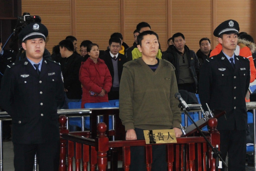 Pilot Qi Quanjun stands trial yesterday in a court in Yichun, Heilongjiang. Photo: Xinhua