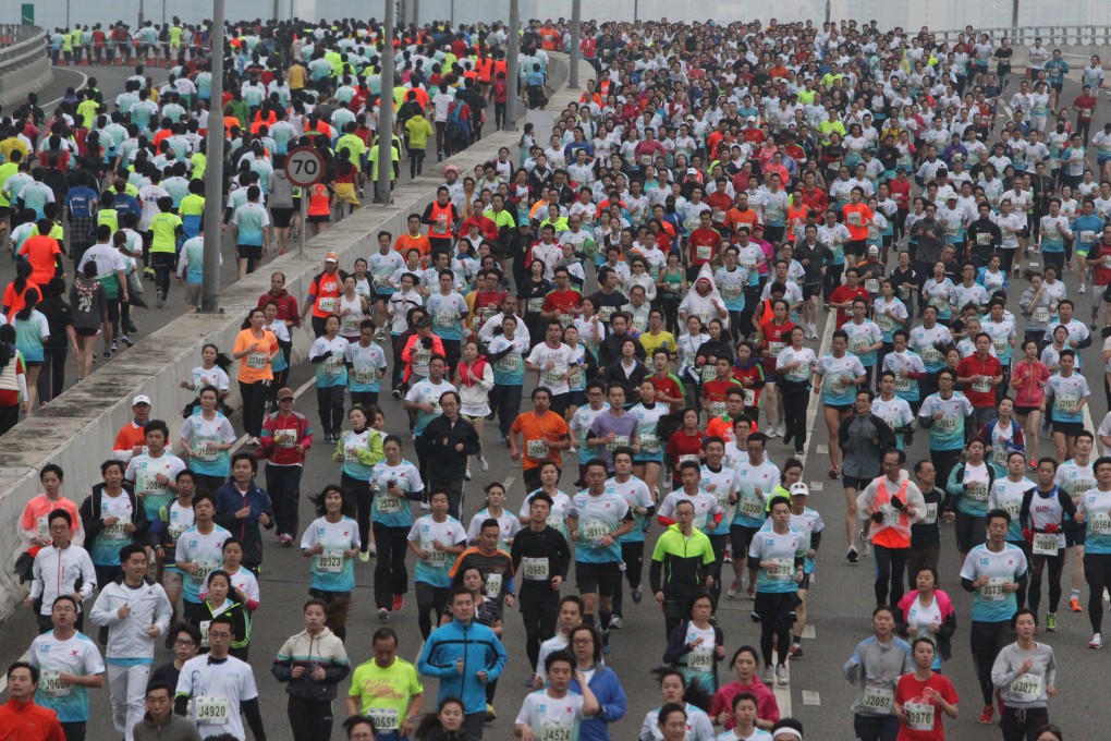 The Hong Kong Marathon has reached saturation point with about 73,000 runners expected for next year's event. Photo: Felix Wong