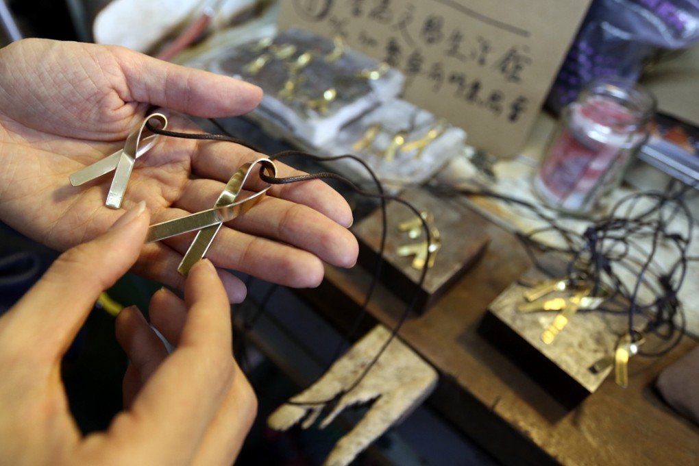 Handmade brass yellow ribbons at "Yellow Market" at Foo Tak Building in Wan Chai. Photo: Jonathan Wong