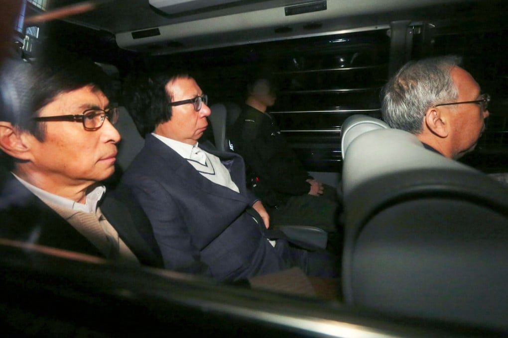 (From left) Thomas Chan and Thomas Kwok, formerly of Sun Hung Kai Properties, and ex-chief secretary Rafael Hui are taken to the High Court yesterday. Photo: Felix Wong