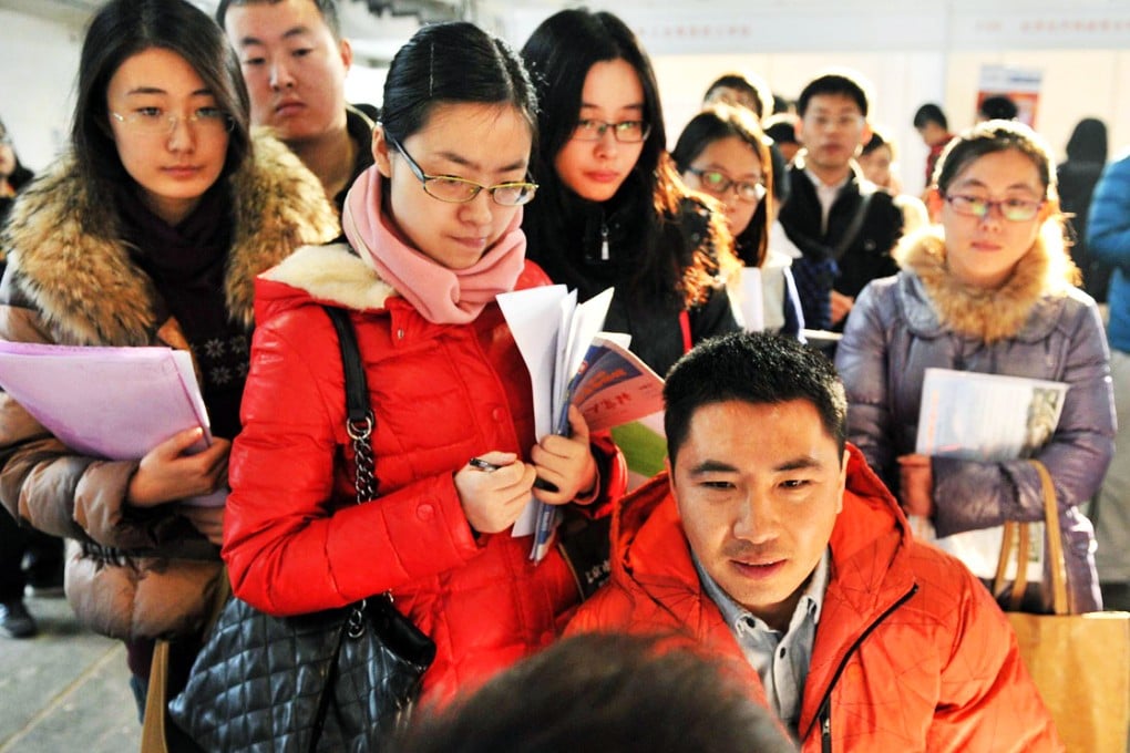 Graduates attend a job fair in Beijing. Internet finance is now seen as a desirable career by well-educated young Chinese. Photo: Xinhua