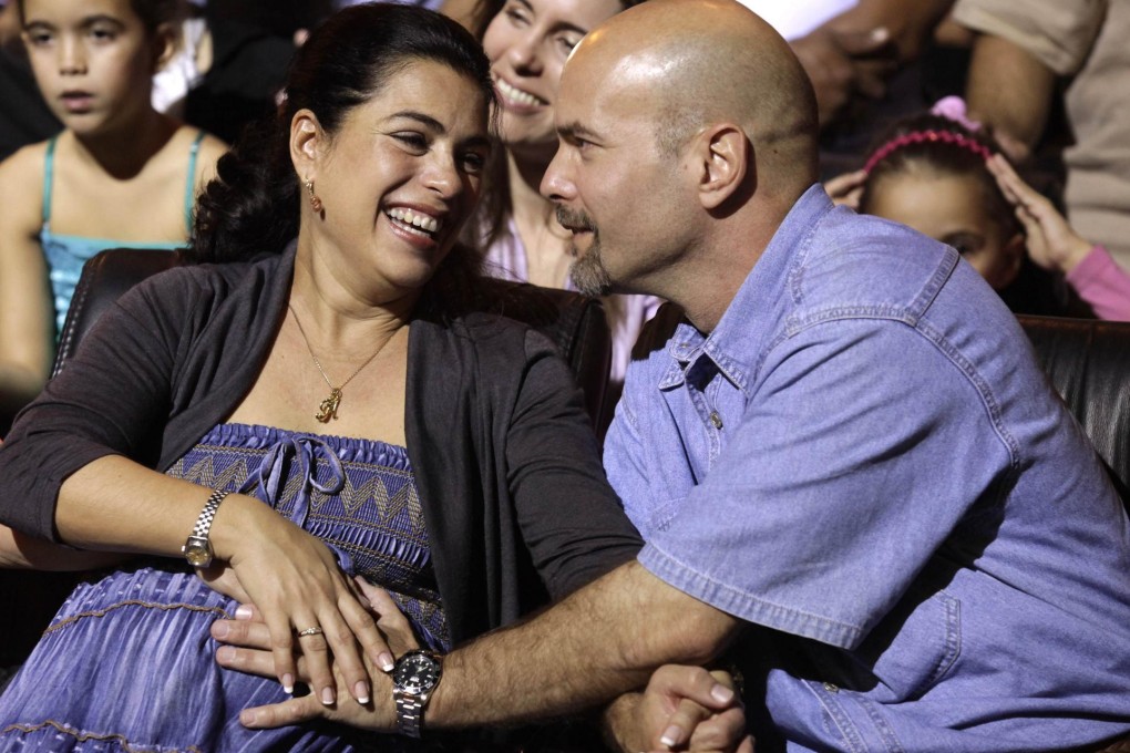 Gerardo Hernandez with his pregnant wife, Adriana. Photo: Reuters
