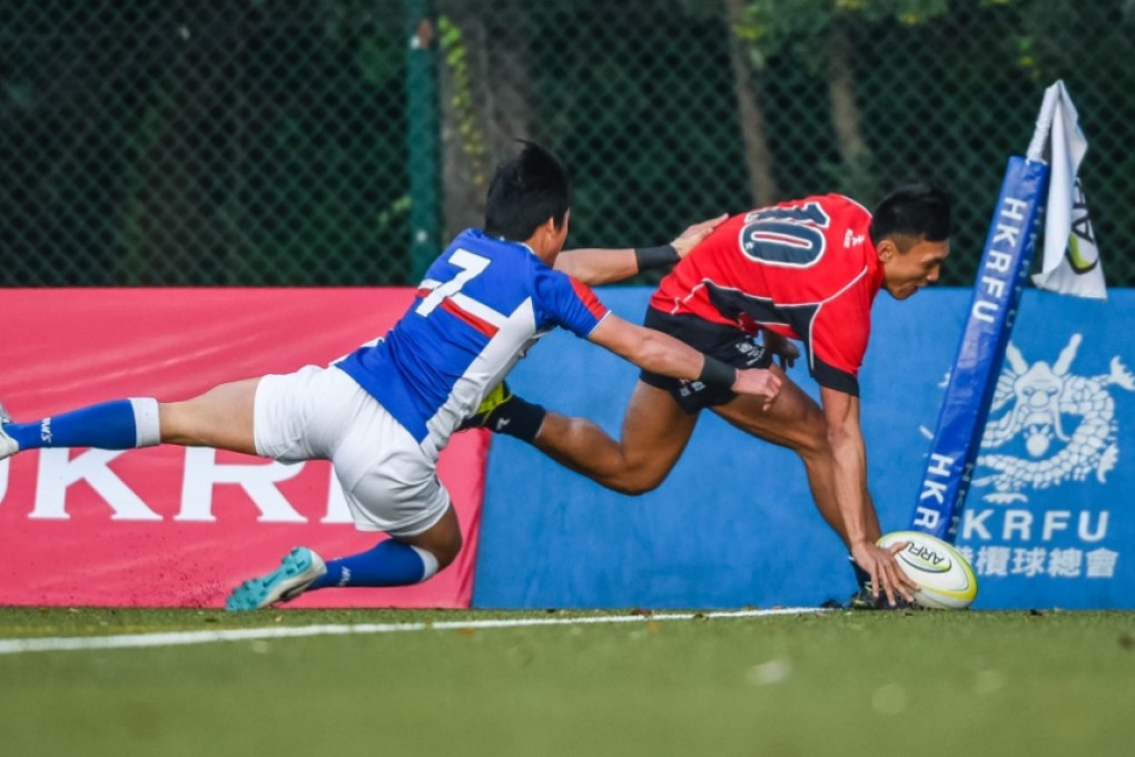 Hong Kong’s Eric Kwok Pak-nga scores in the Hong Kong U20 Sevens Series final against South Korea. Photo: Asian Rugby Football Union