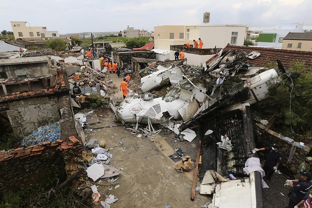 The aircraft came down in a village about 1 km from the airport in Penghu. Photo: Reuters