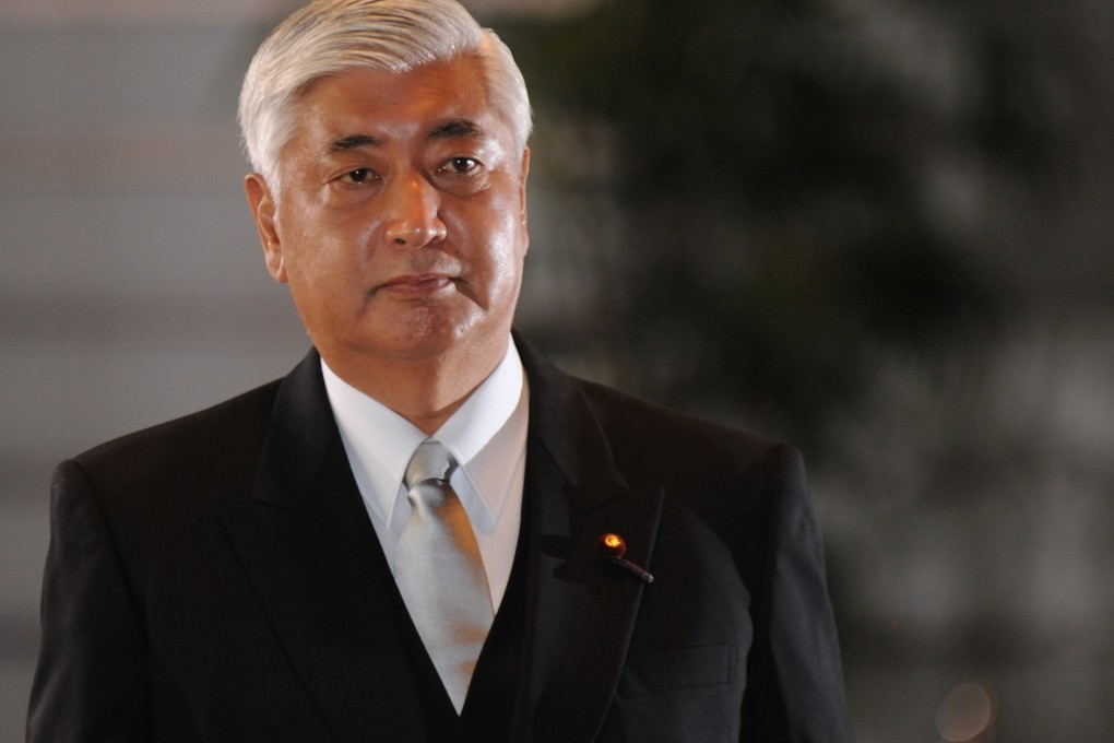 Newly appointed Japanese Minister of Defence Gen Nakatani enters the Prime Minister's office in Tokyo on Dec. 24, 2014. Photo: Xinhua