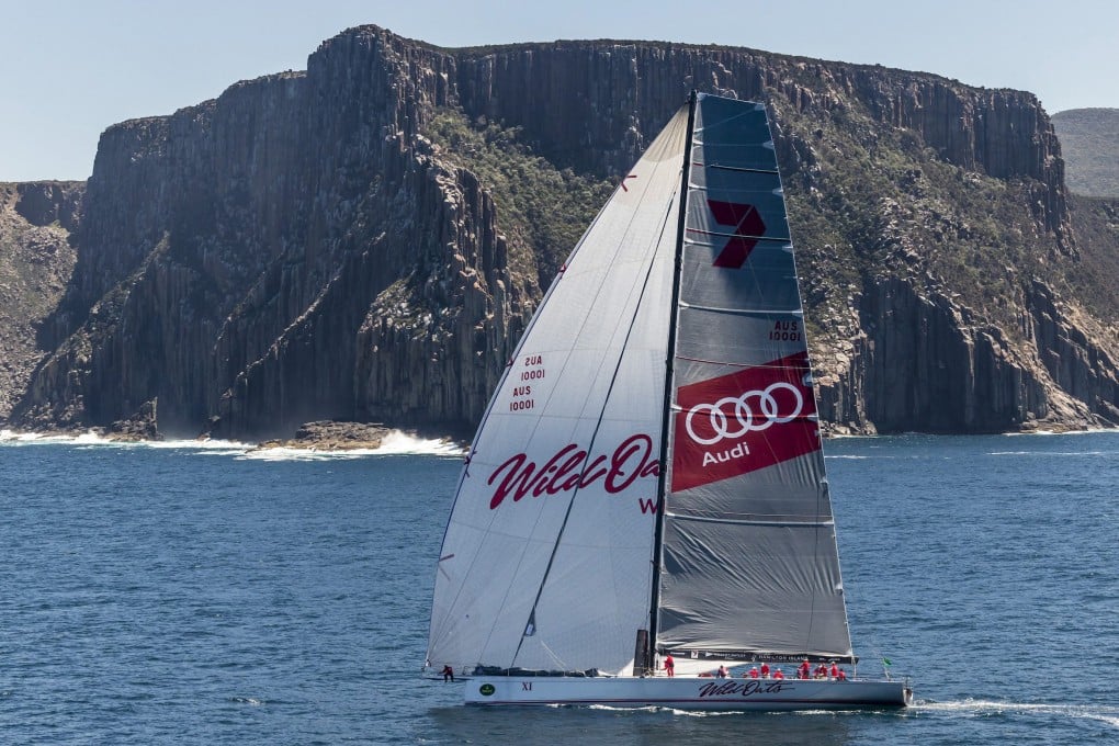 Wild Oats steers into Constitution Dock after winning the Sydney-Hobart race. Photo: EPA