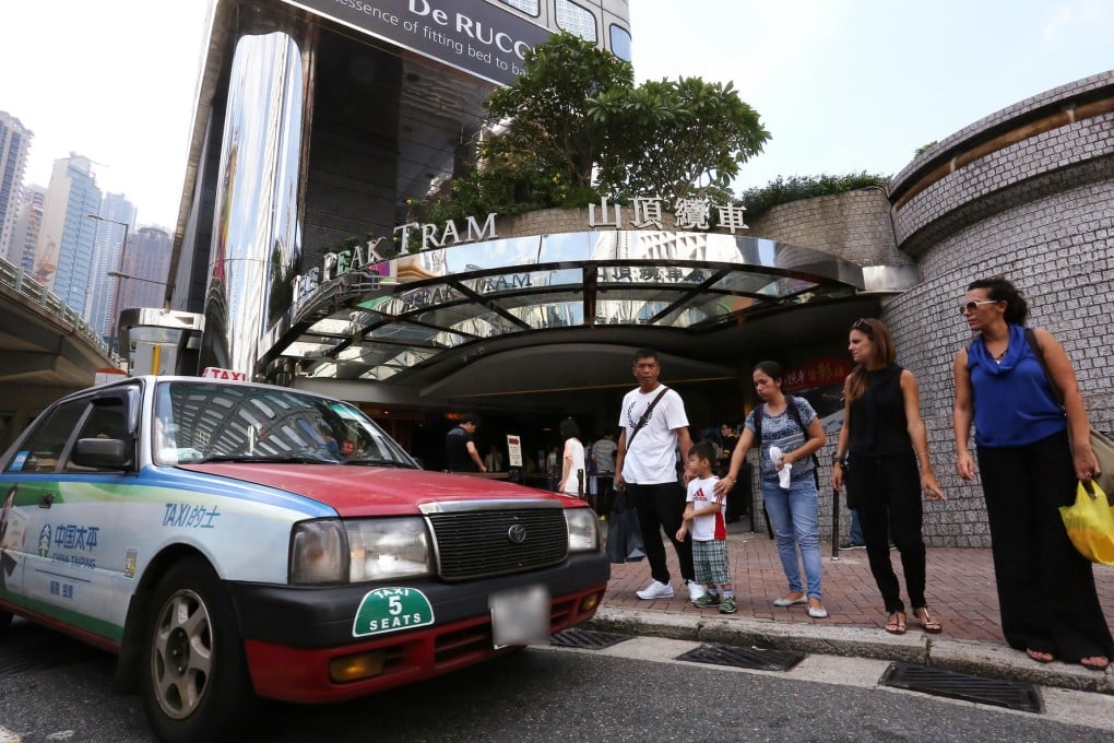 Fed up with crowded trams, many take a taxi. Photo: Jonathan Wong
