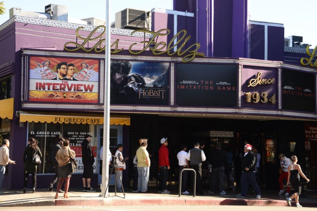 Movie goers queue for "The Interview" at a theater in Los Angeles. Photo: AFP
